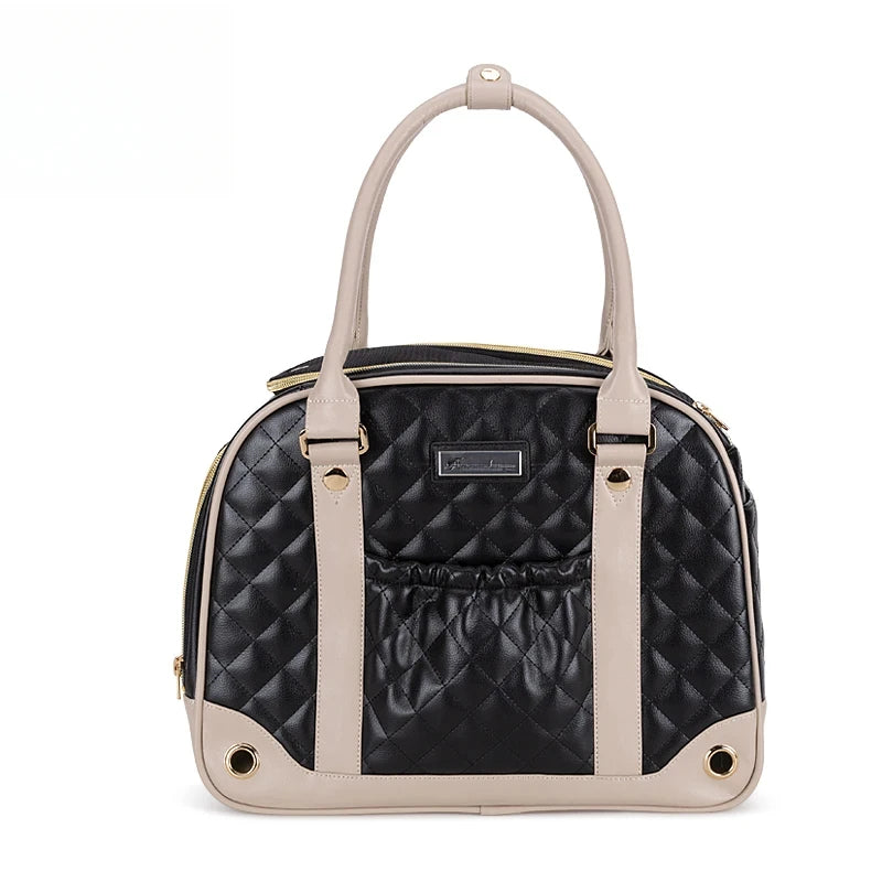 Black and beige quilted handbag on a white background