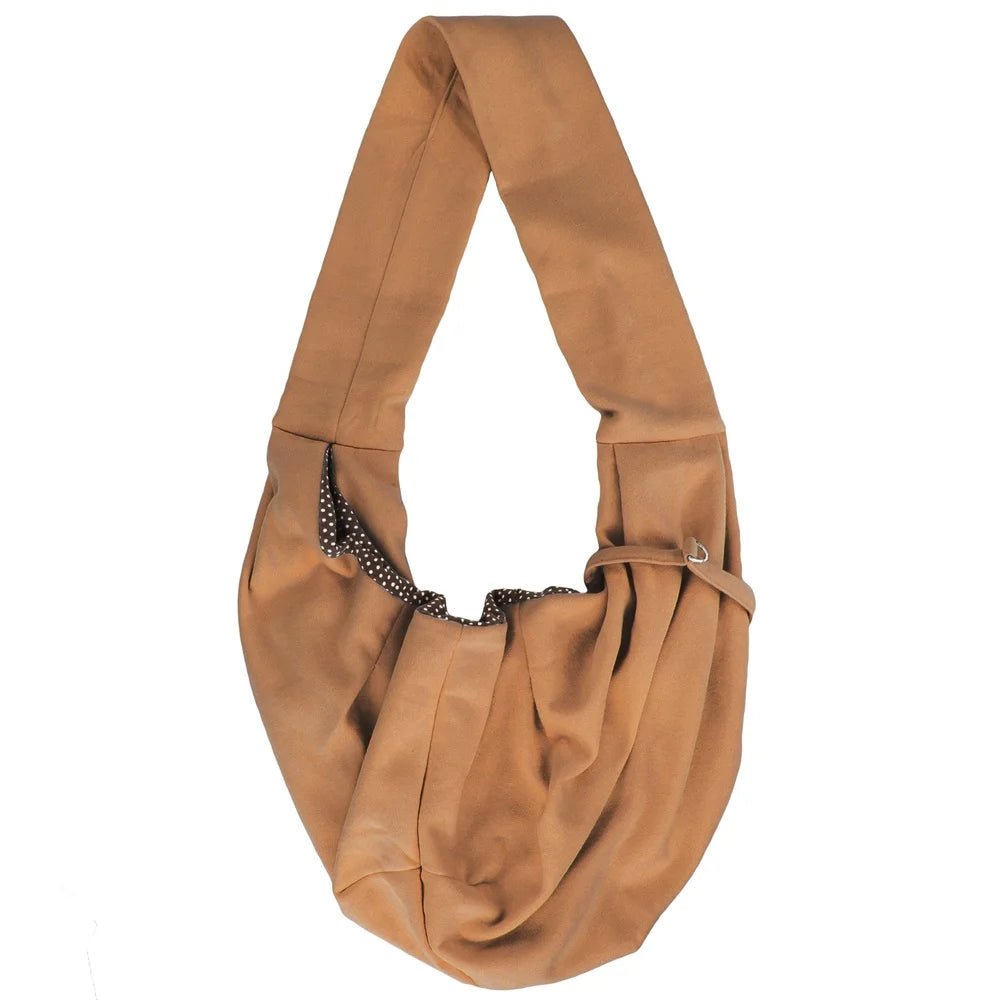Brown leather handbag with decorative trim on a white background