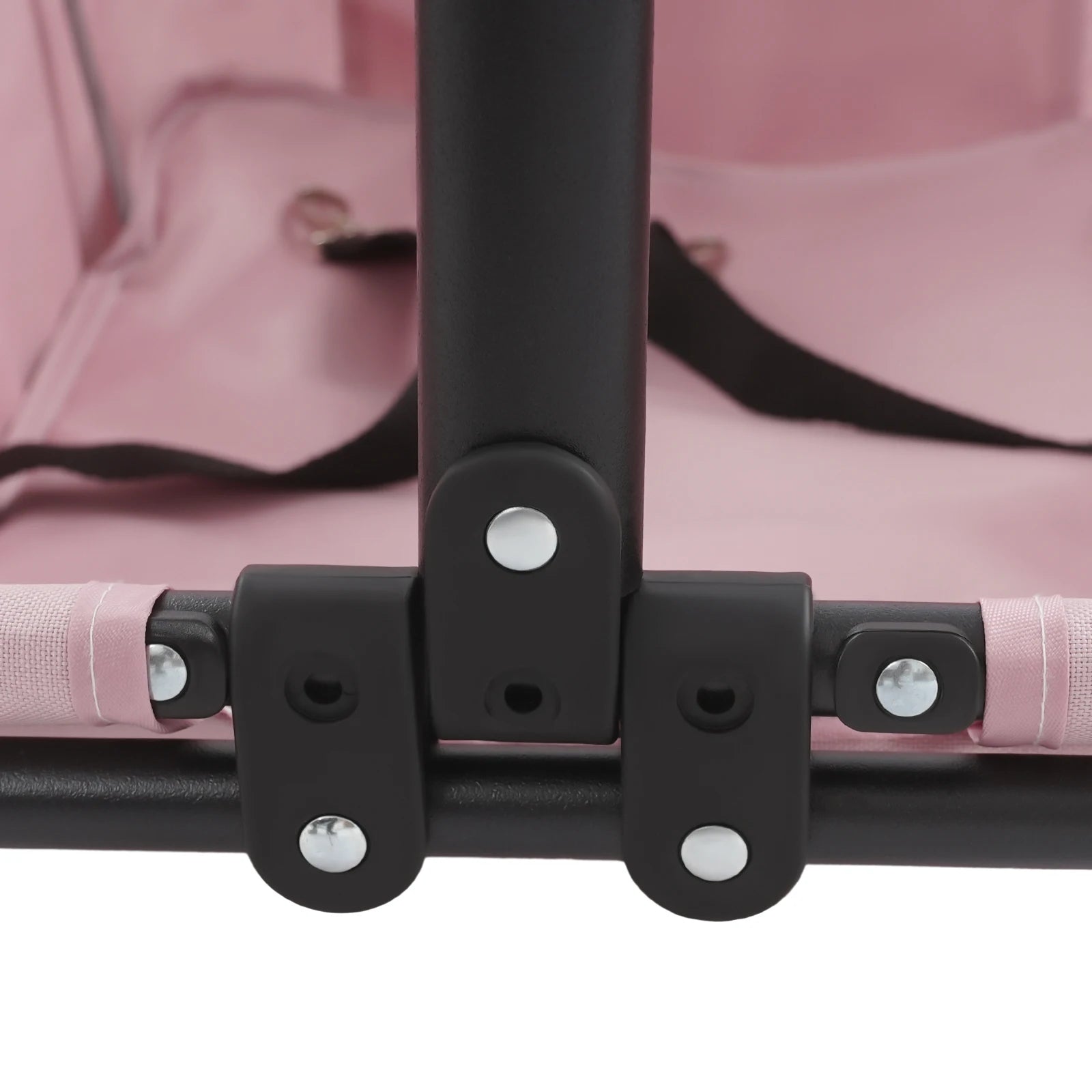 Close-up of a pink baby stroller with black frame details on a white background