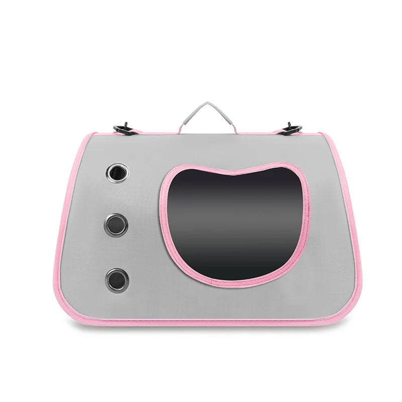 Gray pet carrier with pink trim on a white background