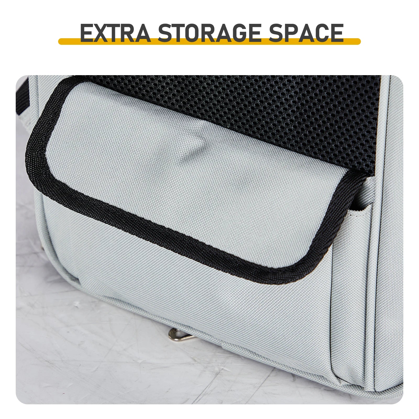 Gray pouch with black mesh detail on a light wooden surface, labeled 'Extra Storage Space'.