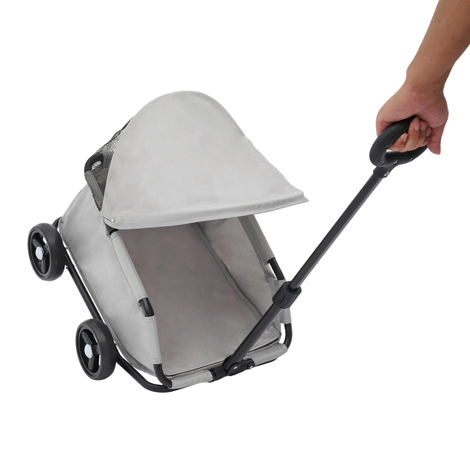 Gray stroller with a canopy being pushed by a hand on a white background