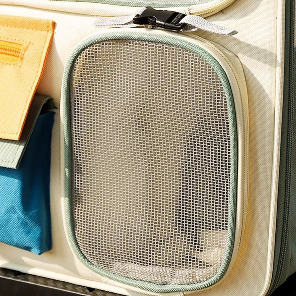 Mesh pouch with a zipper on a suitcase