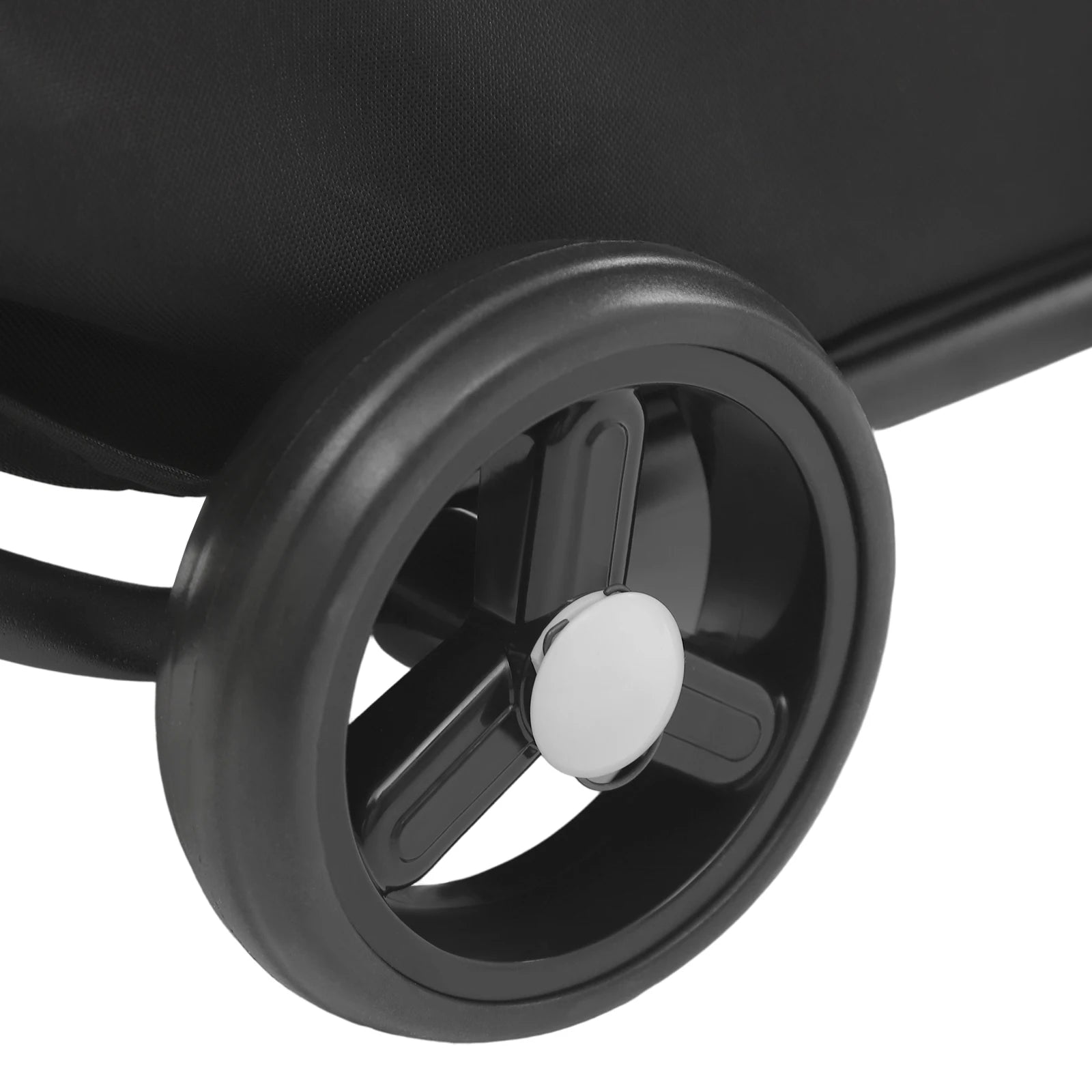 Close-up of a black wheel with a white hub on a white background