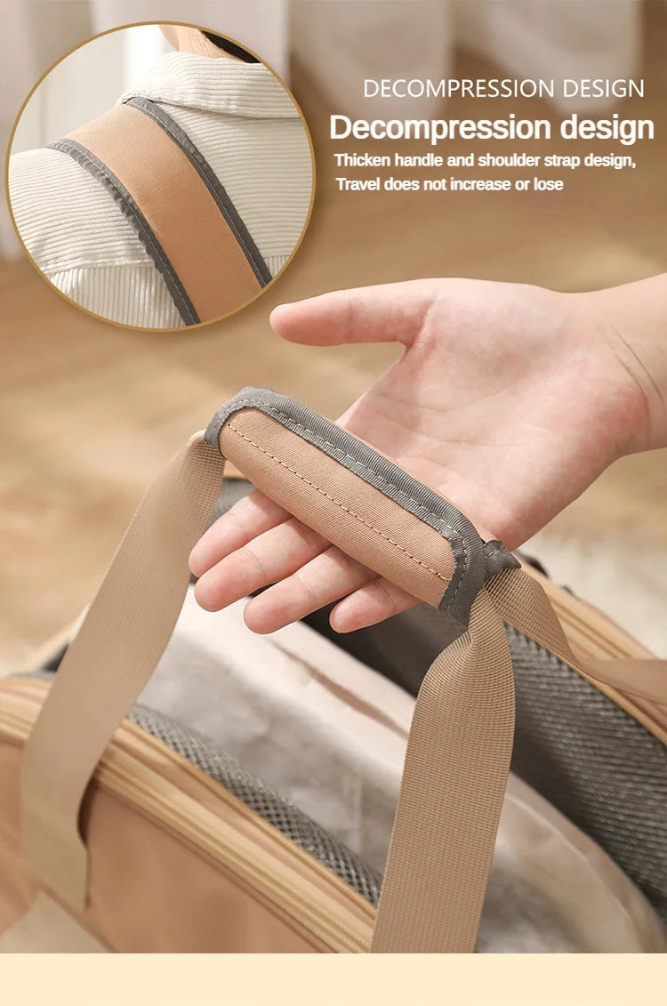 Hand holding a decompression design travel bag with close-up of handle