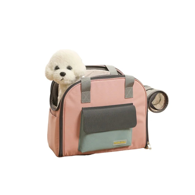 Pink pet carrier with a small white dog inside on a white background