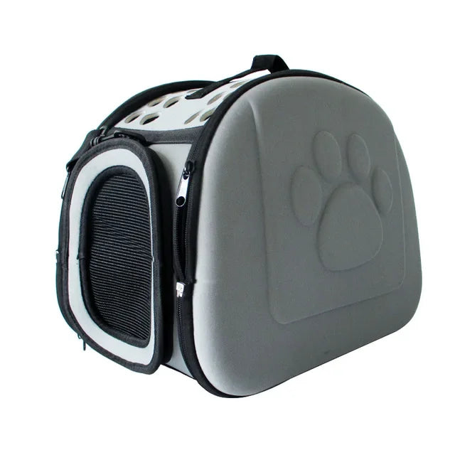 Pet carrier with a paw print design on a white background