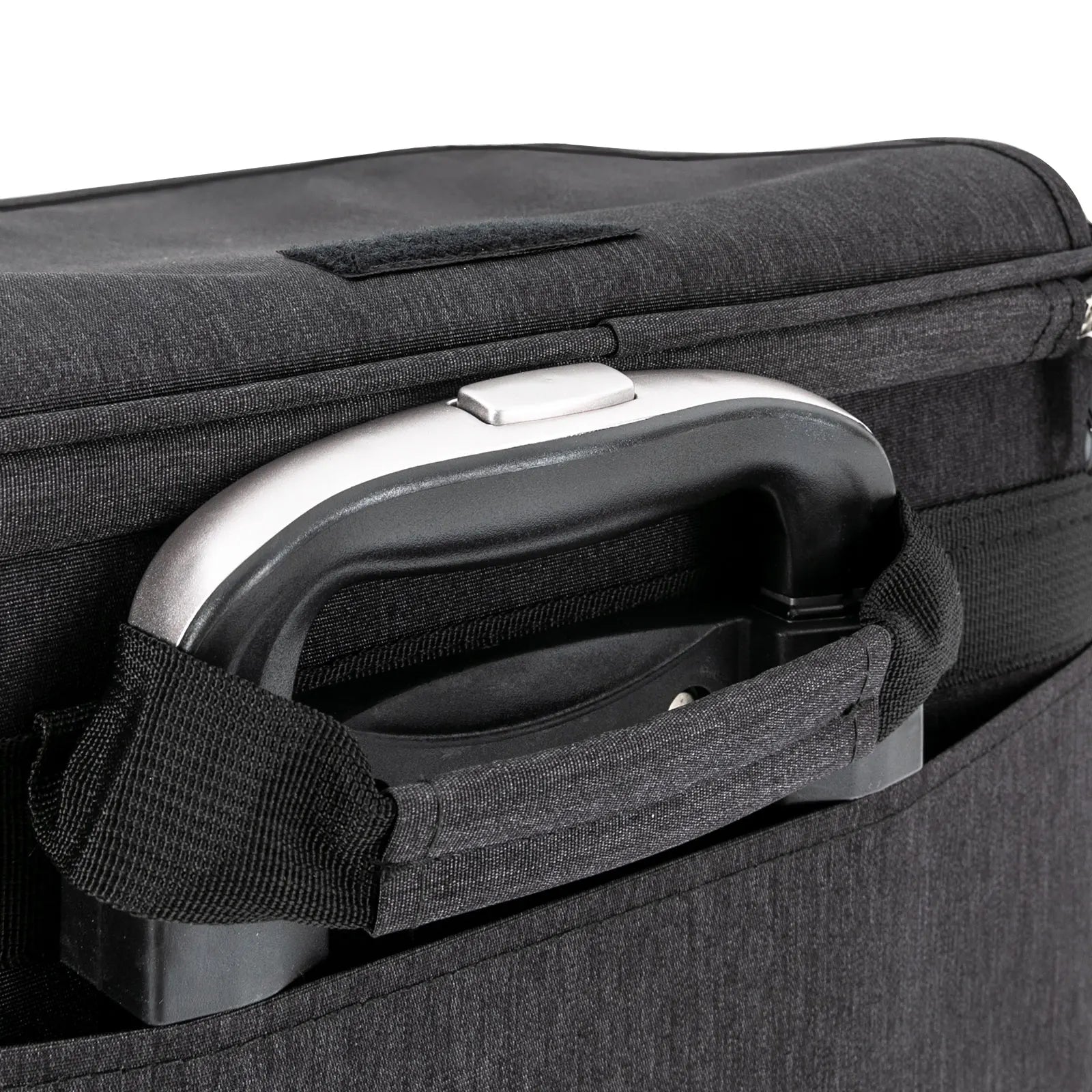Close-up of a black suitcase handle and grip