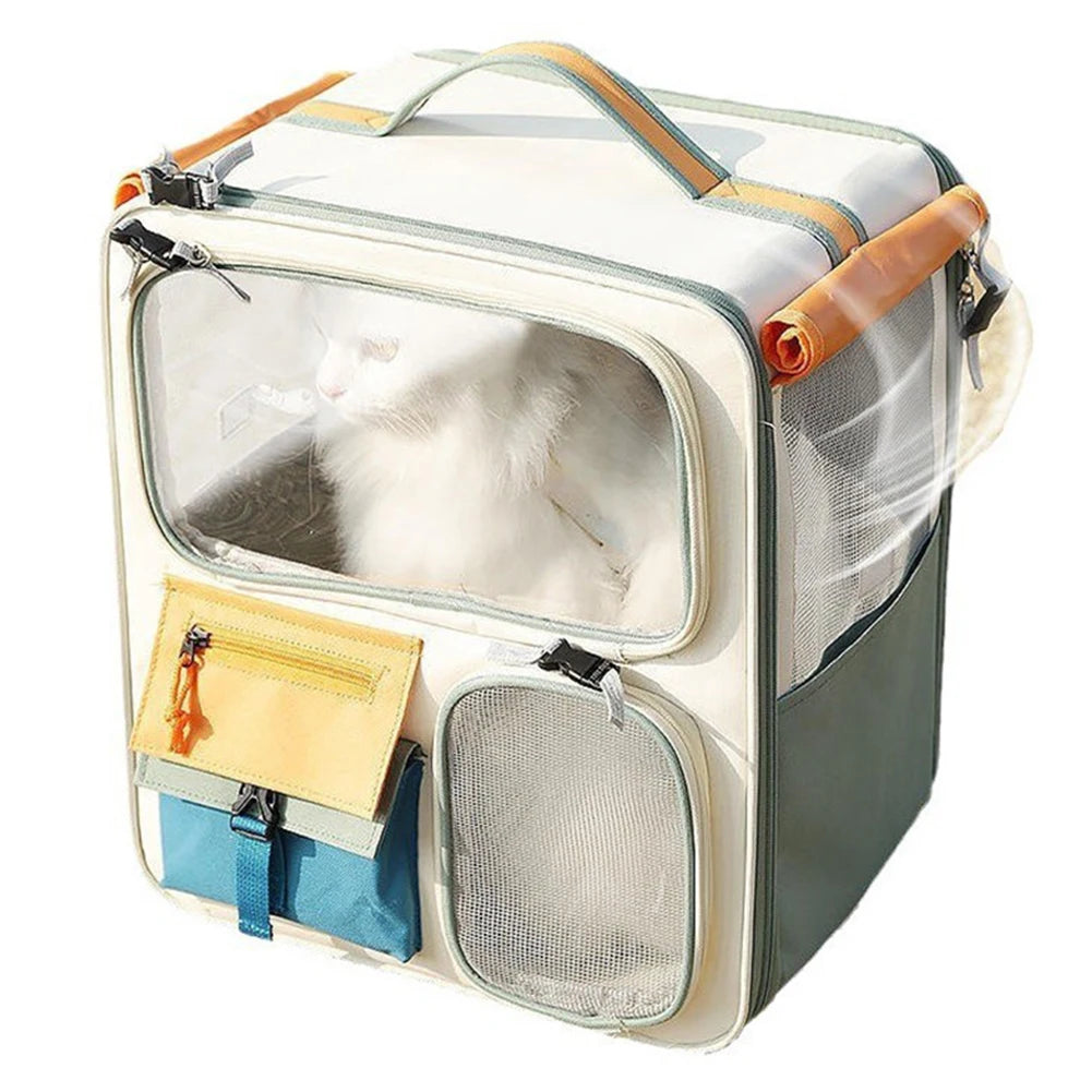Pet carrier with a transparent front panel, orange handle, and blue side pocket on a white background.