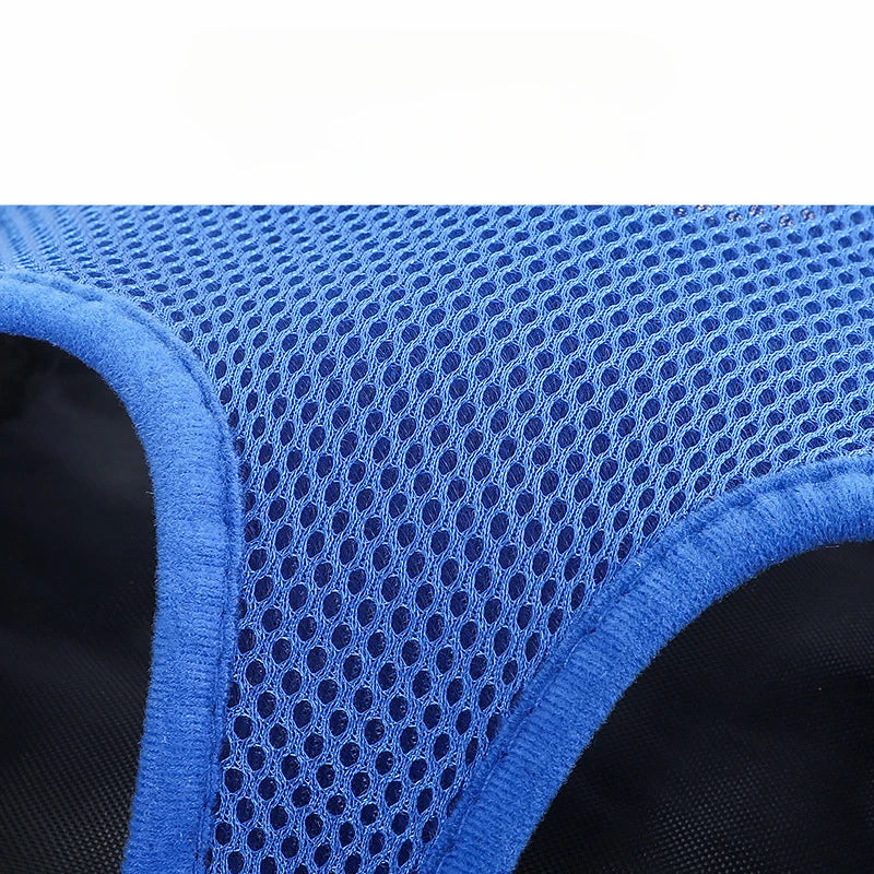 Close-up of a blue mesh fabric with a black background