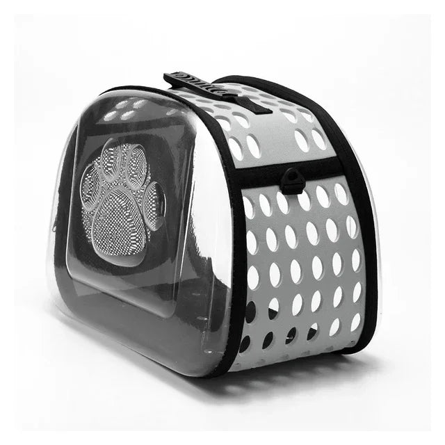 Pet carrier with paw print design on a white background