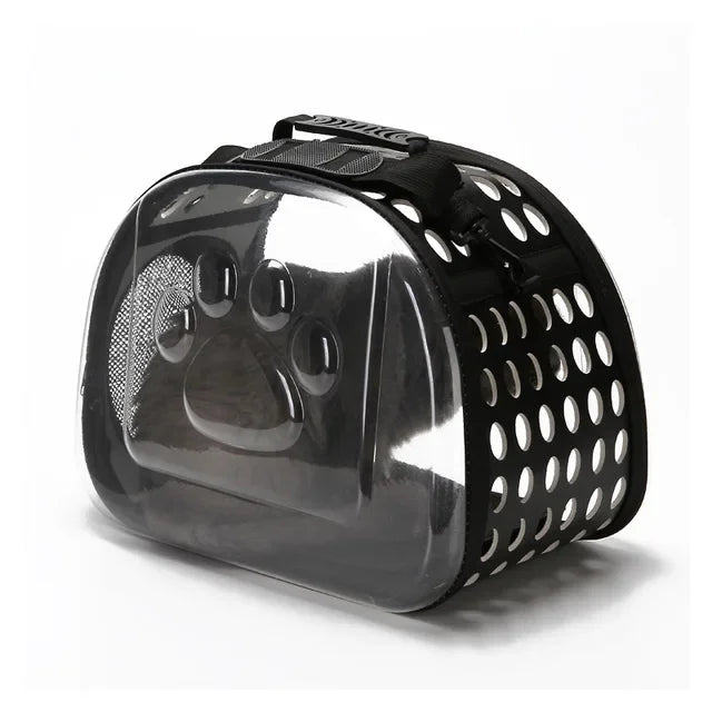 Black pet carrier with paw design on a white background