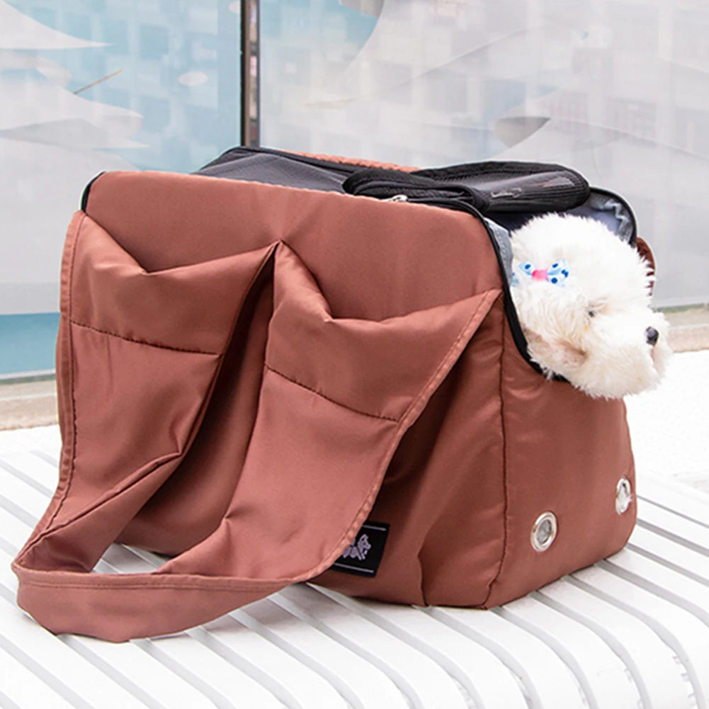 Brown pet carrier with a small white dog peeking out, placed on a light-colored surface.