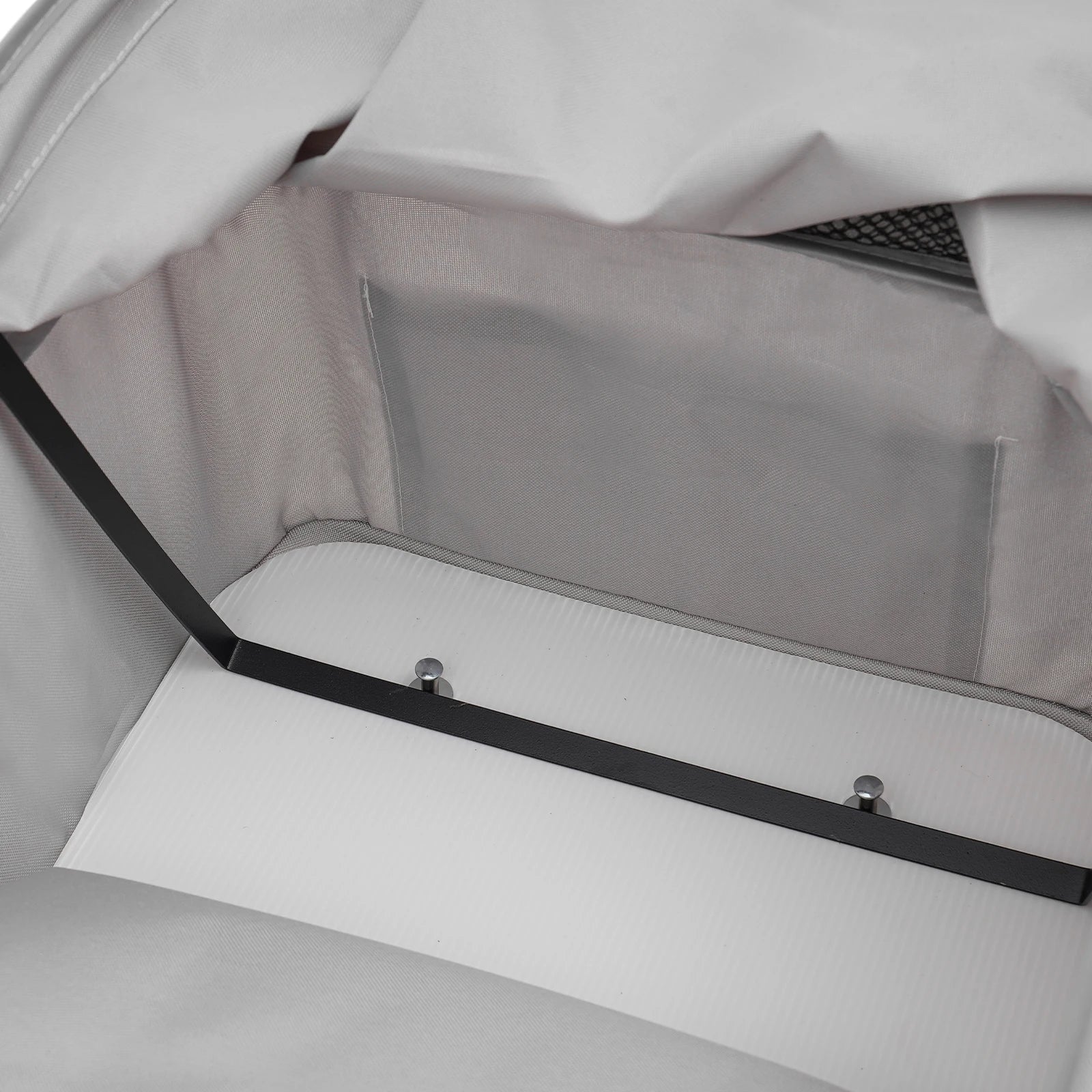 Close-up of a car's open trunk with a gray interior.