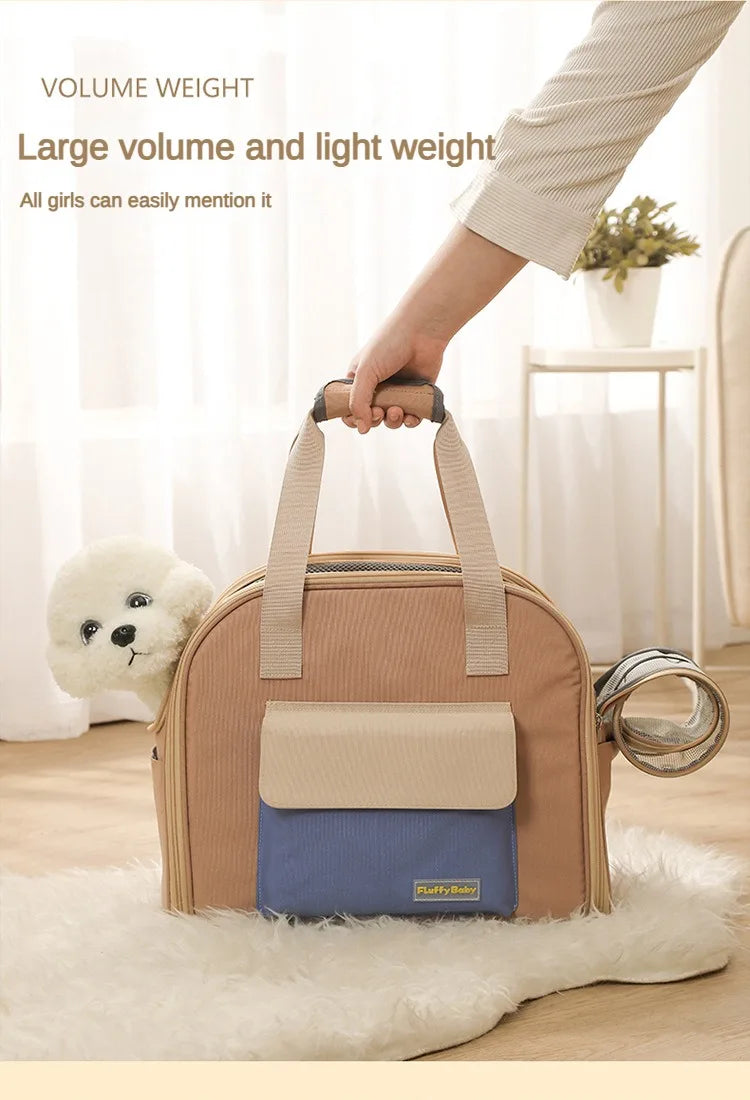 Hand holding a beige and blue pet carrier with text about volume and weight on a light background.