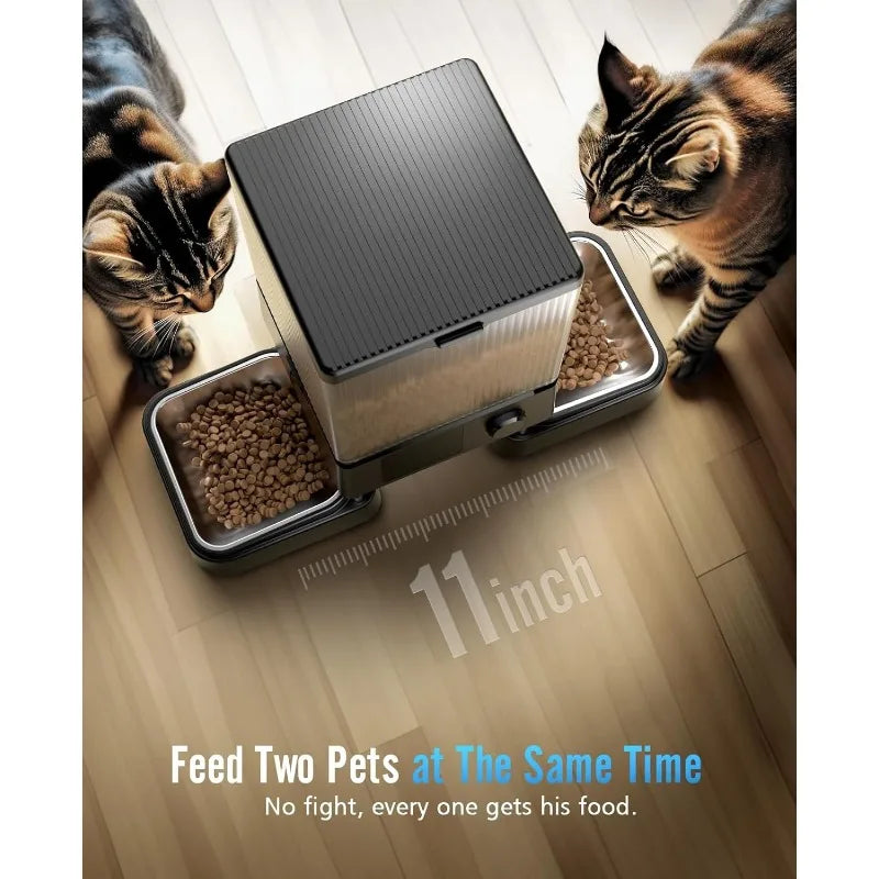 Pet feeder with two cats eating from it on a wooden floor.