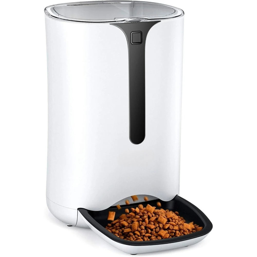White pet food dispenser with a black tray containing pet food on a white background