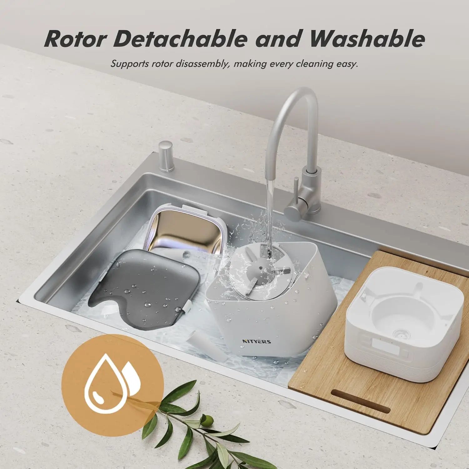 Kitchen sink with cleaning products and text highlighting rotor detachability and washability.