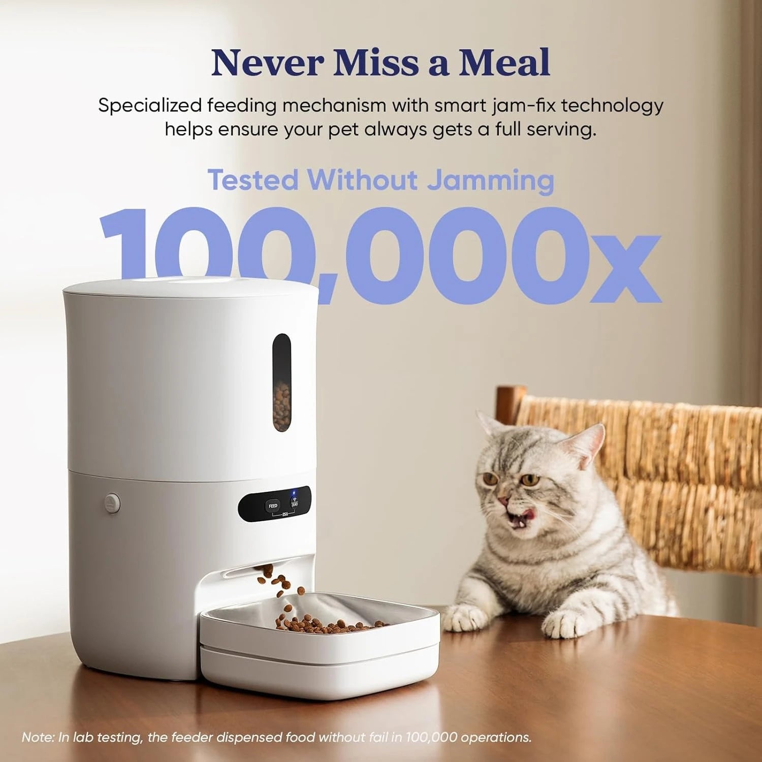 Automatic pet feeder dispensing food with a cat sitting nearby, on a wooden table.