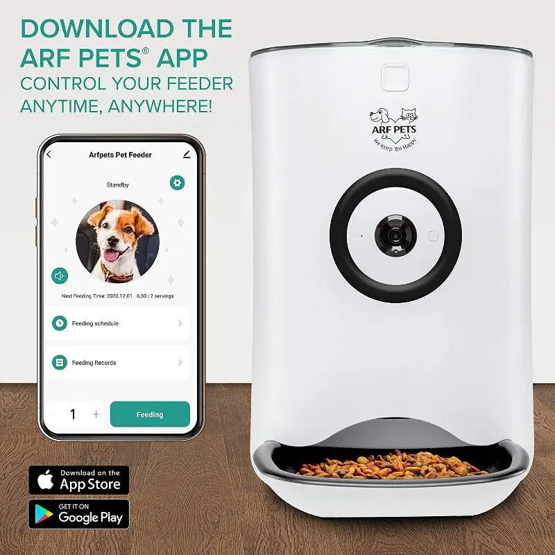 White pet feeder with smartphone displaying app interface on a wooden surface