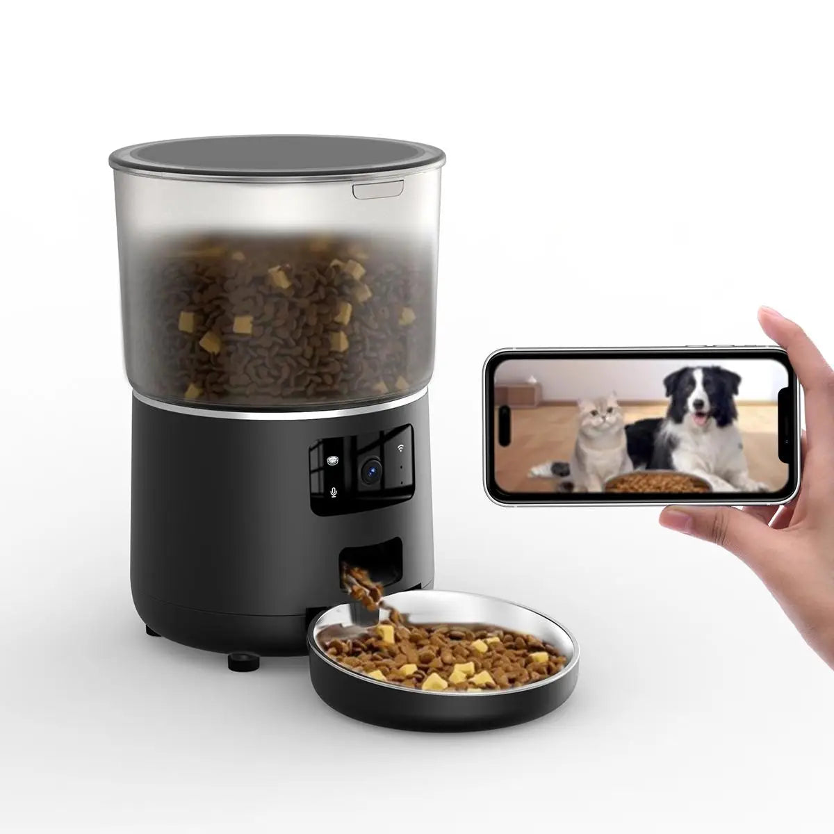 Pet food dispenser with a bowl of food and a smartphone displaying two dogs.