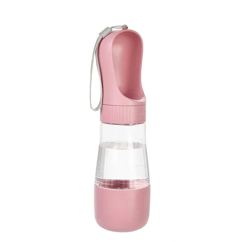 Pink and clear water bottle with a handle on a white background