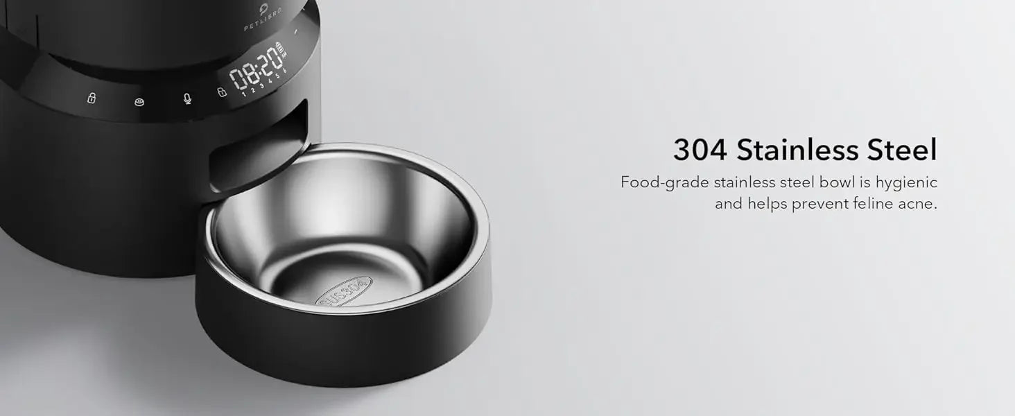 Stainless steel pet bowl with digital display on a gray background