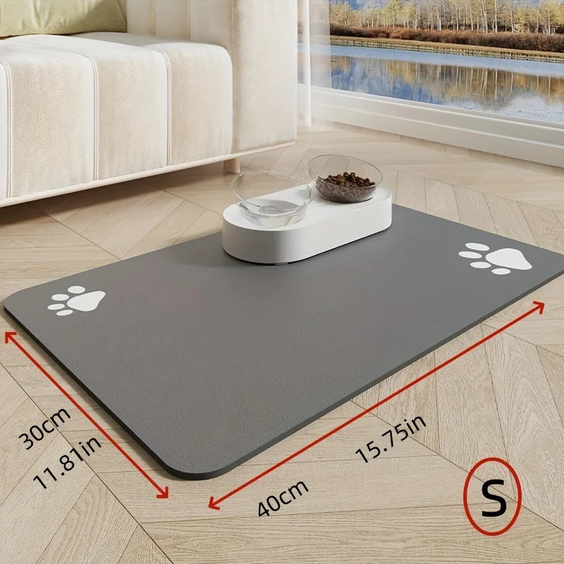 Gray pet mat with paw prints on a wooden floor in a living room setting.
