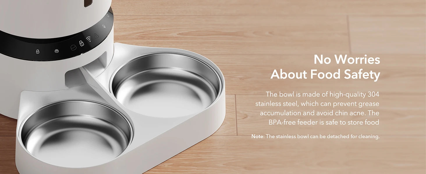 Pet feeder with two bowls on a wooden surface, featuring text about food safety.