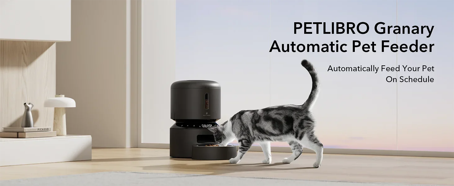PETLIBRO Granary Automatic Pet Feeder with a cat interacting with it in a modern indoor setting.
