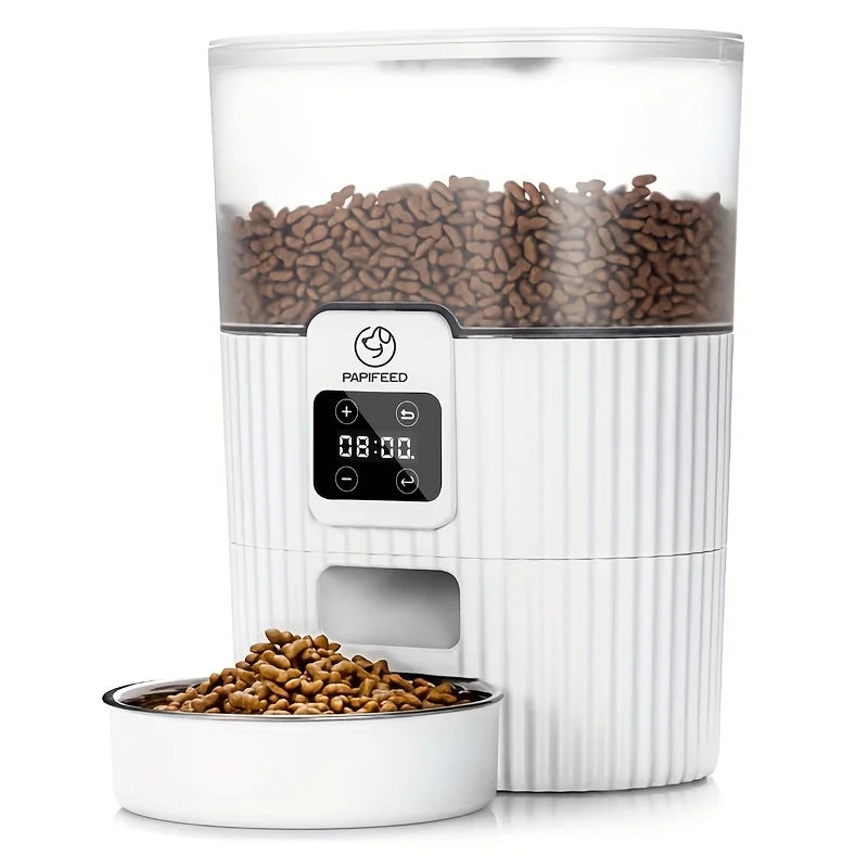 White pet food dispenser with digital display and bowl of pet food on a white background