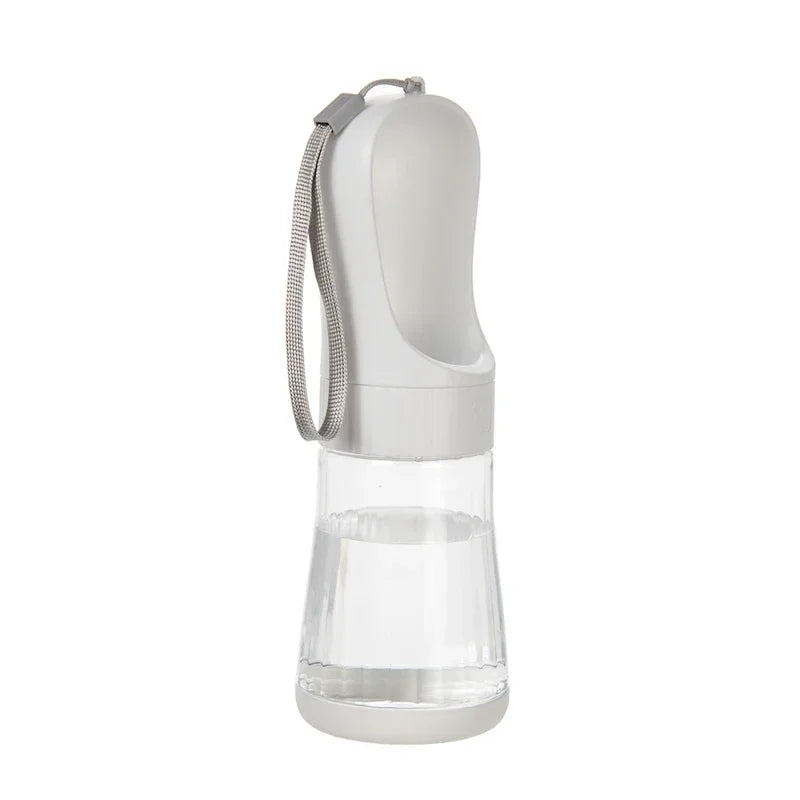 Clear water bottle with a gray cap and handle on a white background