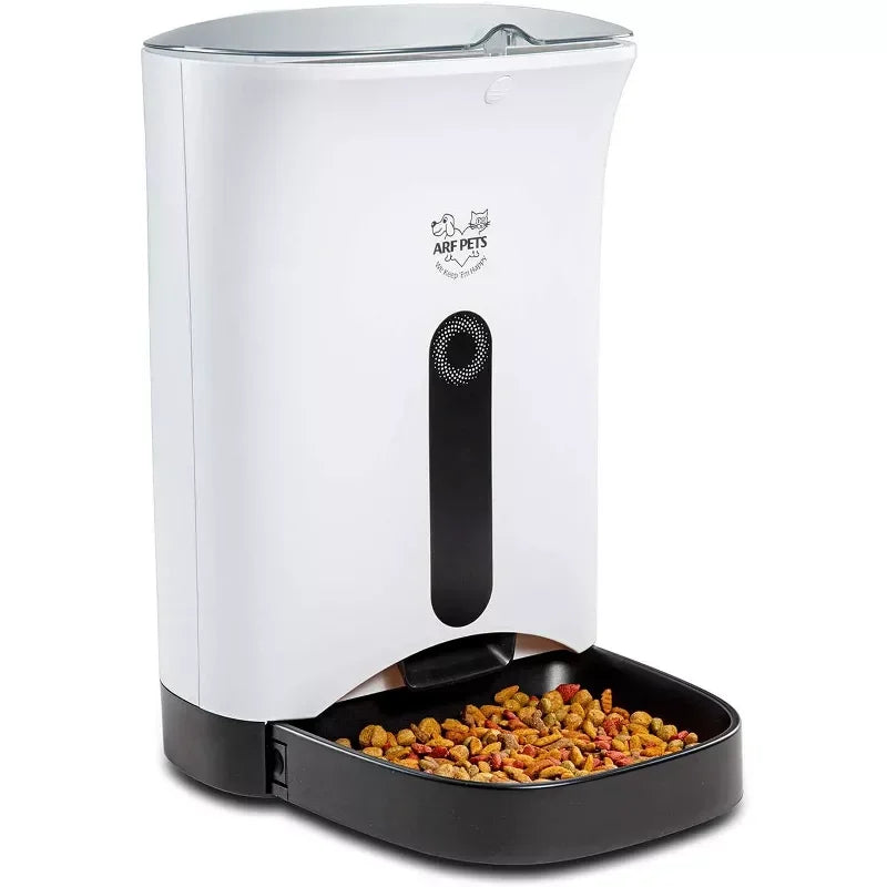 Pet food dispenser with food inside on a white background