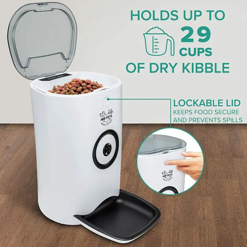 White pet food dispenser with lockable lid on a wooden floor, showing capacity and features.