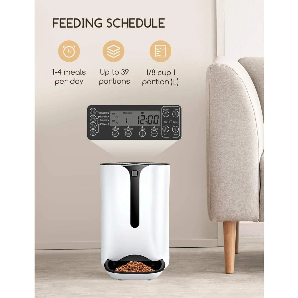 White pet feeder with digital display on a wooden floor, featuring a feeding schedule.